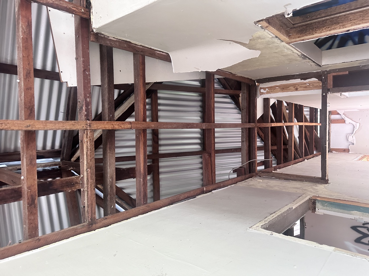 Interior Asbestos Wall Panels Before Safe Removal